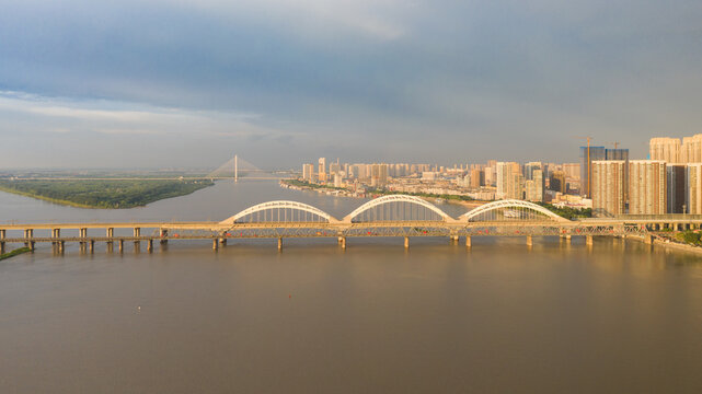 Harbin Railway Bridge over Songhua River, China at Sunset