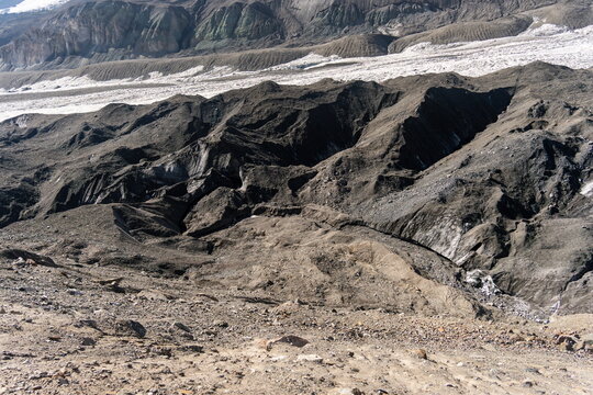 Lenin Glacier meets rocky moraine terrain in Kyrgyzstan, August