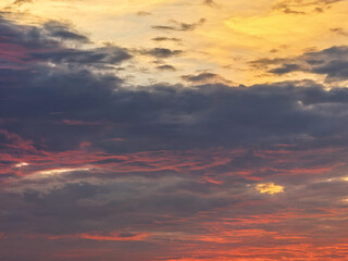 Fototapeta premium Dramatic Sunset Cloudscape with Glowing Orange and Pink Sky