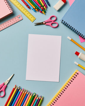 School supplies blank paper colorful pencil notebook scissor ruler eraser glue back to school stationery education learning study classroom flat lay top view pastel color art material drawing