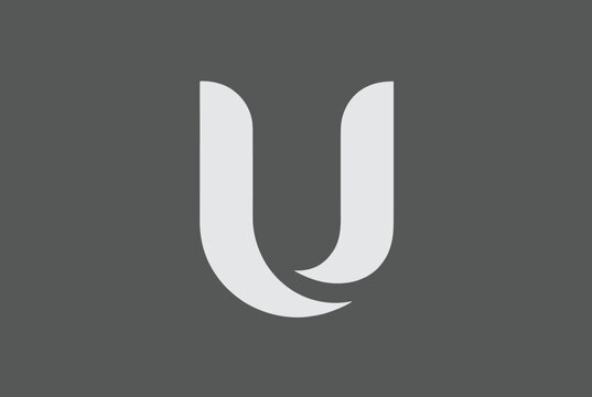 Minimalist white logo design of the letter U featuring elegant curved ribbon shapes on a solid dark grey background.
