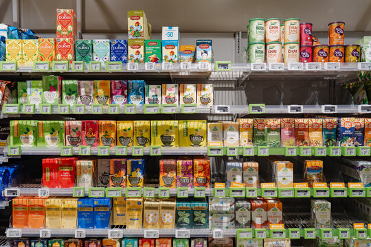 August 20, 2026, Amsterdam, Netherlands - Various tea brands and flavors displayed on shelves at an Albert Heijn XL supermarket