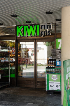 August 18, 2026, Hoyanger, Norway - Entrance of a KIWI mini pris supermarket with outdoor product displays