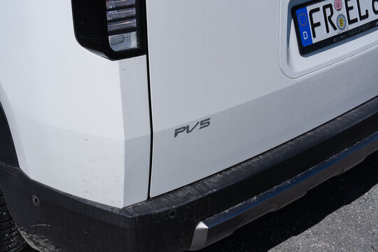 August 18, 2026, Balestrand, Norway - Rear view of a white vehicle with 'PV5' emblem and German license plate