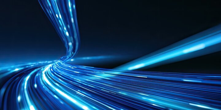 Streaks of bright blue light curve and zoom across a dark background