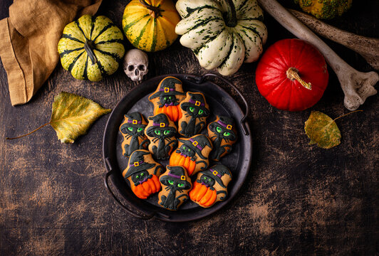 Spooky Halloween cookies in shape of black cat