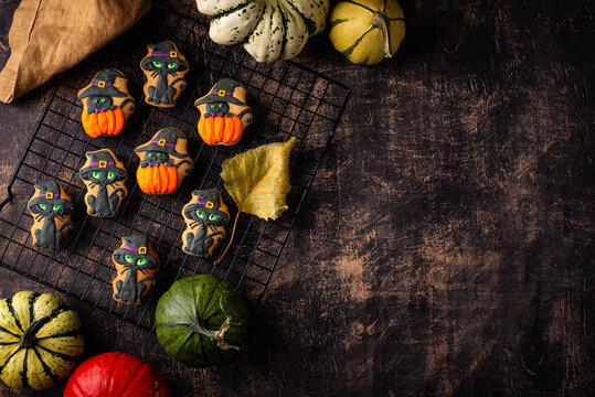 Spooky Halloween cookies in shape of black cat