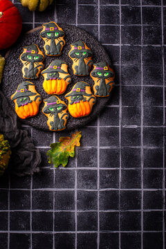 Spooky Halloween cookies in shape of black cat