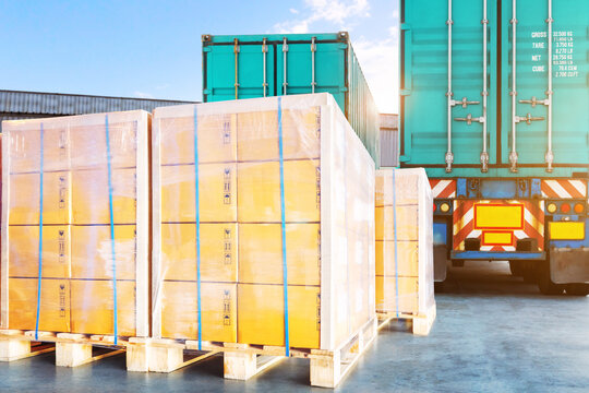 Goods awaiting loading into containers trucks. bulk of package boxes shipment. freight transportation logistics. distribution warehouse shipping. warehouse logistics