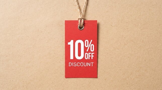 A vibrant red tag displays 10% OFF DISCOUNT, attached by a rustic twine against a textured, neutral background, symbolizing a great deal.