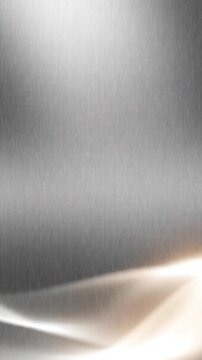 Brushed metal texture with glowing light waves sweeping across a vertical surface in this modern abstract digital motion video clip