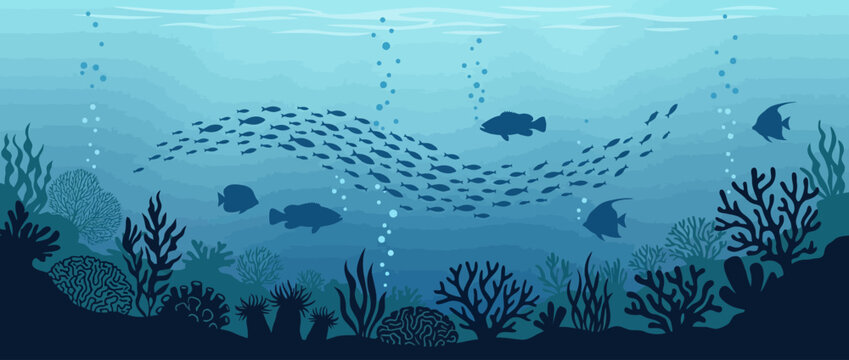 School of fish swimming in deep blue ocean with coral reef background