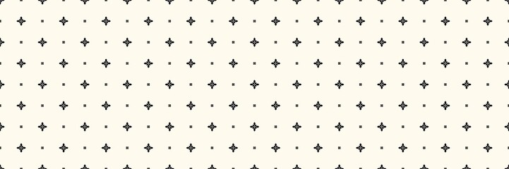 Fototapeta premium Geometric floral seamless pattern. Simple black flowers on a cream background. Seamless black floral star pattern on beige background. Repeatable abstract batik for design, texture, or wallpaper. 