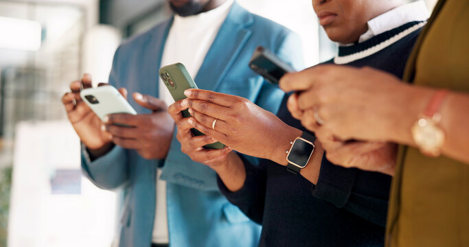 Creative, team and hands with phone in office, online and browsing pr campaign on social media app. Publicist, scroll and people with mobile for project, low angle and collaboration in business