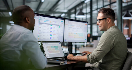 Human Resources Manager Analyzing Employee Performance Data