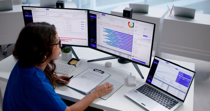 Clinical Trial Manager Carefully Reviews Patient Enrollment Data