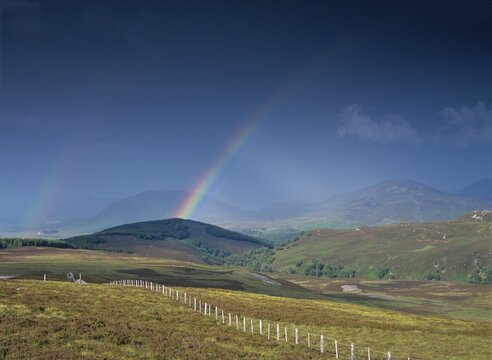 Rainbow after a thunderstorm, hilly landscape near Loch Tarft, Suidhe, Scotland, UK, Europe