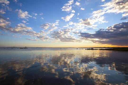 Beautiful clouds reflecting in calm water at Besser Rev in Denmark