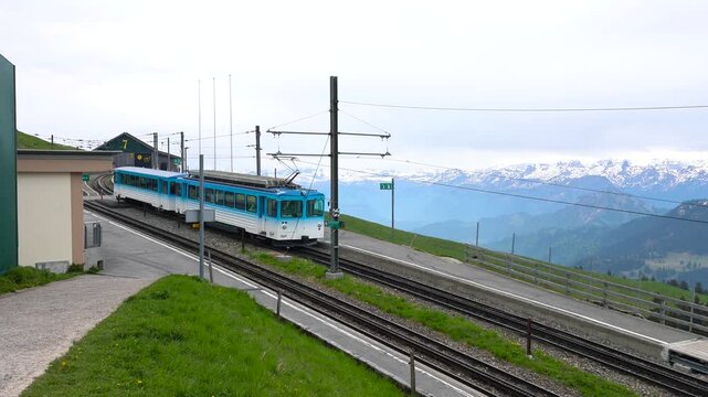 Rigi mountain railway Cogwheel train arriving at the station