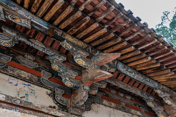 Painted Wooden Eaves of Longmen Temple in Pingshun County Shanxi © TranPhuoc