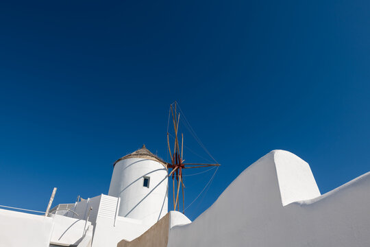 White cycladic windmill in Santorini island, Greece