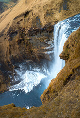 Skogafoss Waterfall View From Above with Ice and Rock Cliff in Iceland © Sonja