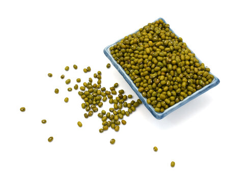 Fresh green mung beans in tray isolated on white background