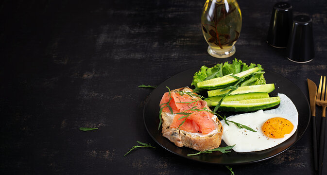 Healthy Breakfast with Smoked Salmon Toast Fried Egg and Fresh Vegetables