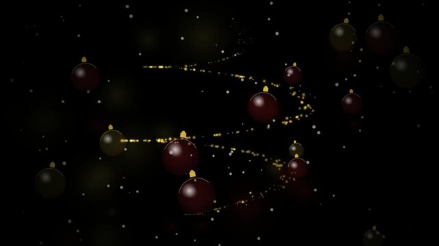 Christmas ornaments with golden glowing light trails on black background
