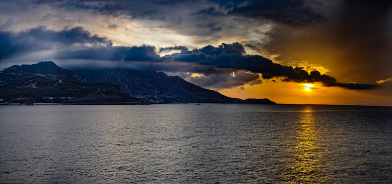 Panoramic sunset over the Mediterranean Sea and mountains near Ceuta, Spain
