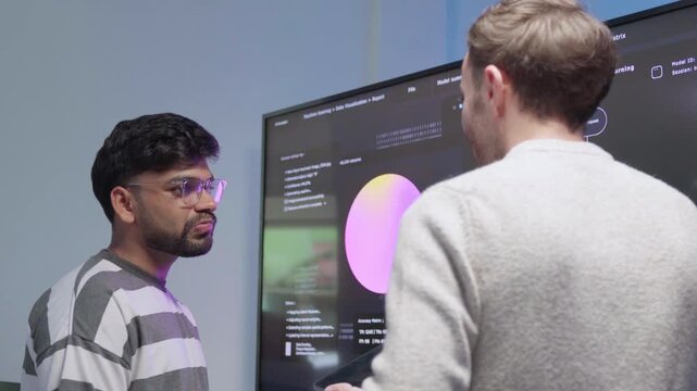 Software engineer brainstorming with team Presenting system cyber security, coding on computer screen. Professional programmer meeting analysis work use technology AI verify code reading data develop