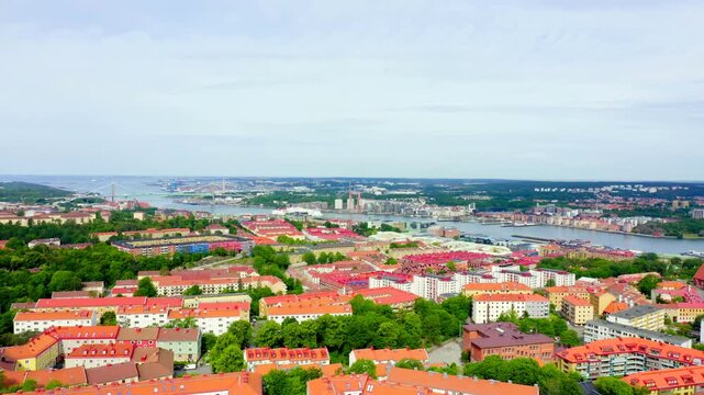 Gothenburg, Sweden. Alvsborg Bridge. (Elvsborgsbrunn) Panorama of the city central part of the city. Cloudy weather. Drone footage