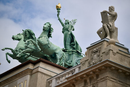 Detailed view of the bronze quadriga sculpture atop the Ethnographic Museum building at Kossuth Lajos Square in Budapest, Hungary