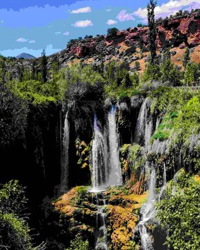 Beautiful Goldere waterfall flowing through lush green forest in Amasra Bartin Turkey