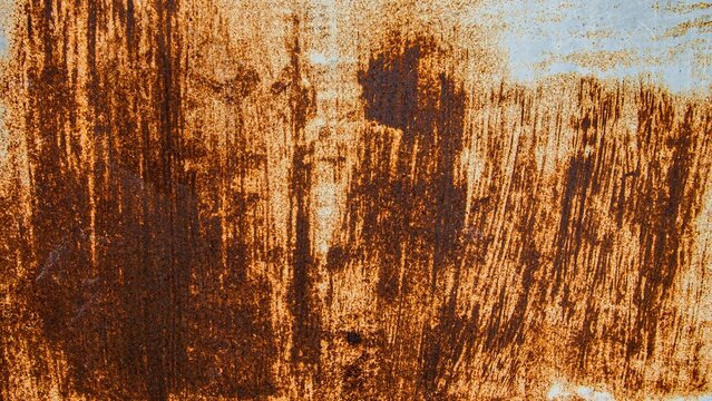 Abstract Rusted Metal Texture With Vertical Streaks and Industrial Corrosion Background