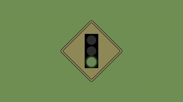 A diamond shaped traffic sign indicating a green traffic light ahead.