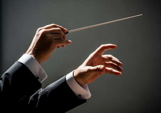 Conductors Hands Leading an Orchestra with a Baton Professionally