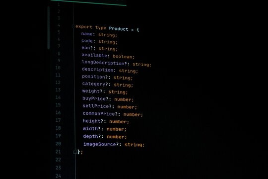 Close-up of a computer monitor displaying TypeScript source code