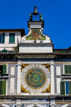 Torre dell'Orologio and its Italian Renaissance astronomical clock, based on Ptolemy's geocentric theories, overlooking the Piazza della Loggia in Brescia