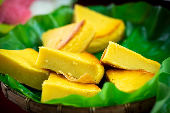 Traditional Banh Dau Xanh Nuong, a rustic Southern Vietnamese baked mung bean cake made from rice flour, sugar, and ground mung beans.