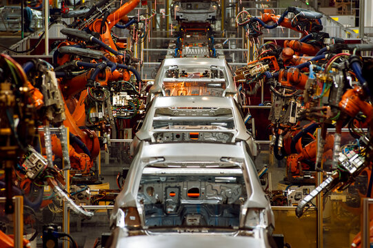 Automated welding robotic arm for automotive factory assembly lines