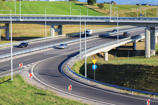 NOWY TARG, POLAND - AUGUST 27, 2026: Multilevel highway interchange with roads branching off in different directions. Modern transport infrastructure, logistics network