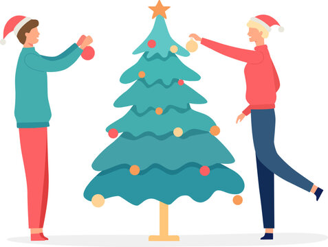 Two individuals in santa hats decorating a festive Christmas tree with colorful ornaments