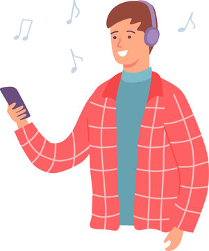 Young man smiling, holding smartphone, and listening to music through headphones