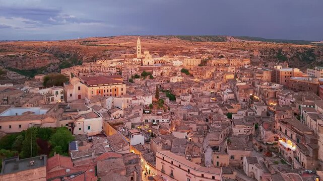 Aerial twilight view of the Sassi and Cathedral in Matera, Basilicata, Italy