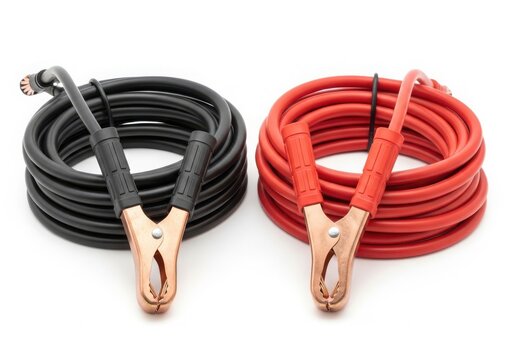 Black and red jumper cables coiled isolated on white background