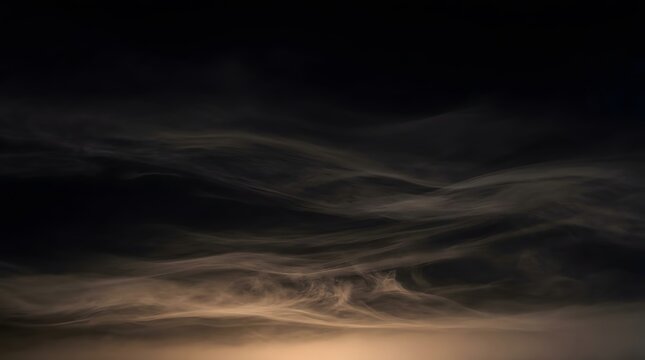 Dark atmospheric clouds rolling over moody night sky for halloween event backdrop 