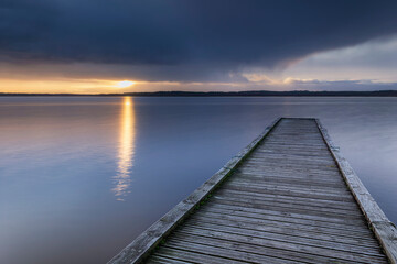 Fototapeta premium pier at sunset