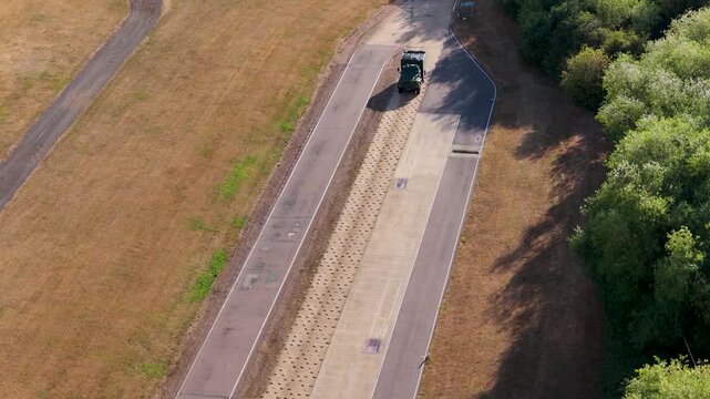 Heavy Truck Driving on a Test Track in Daylight