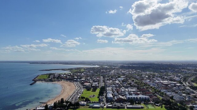 Aerial view over Williamstown Beach and the western suburb coastline with &nbsp;breakwater structures, foreshore parks, and adjacent residential grid. Melbourne, Victoria, Australia
